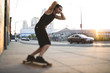 © Simone Becchetti/Stocksy - Young man skater in the city