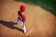 © Sean Locke/Stocksy - Pitcher about to throw a baseball