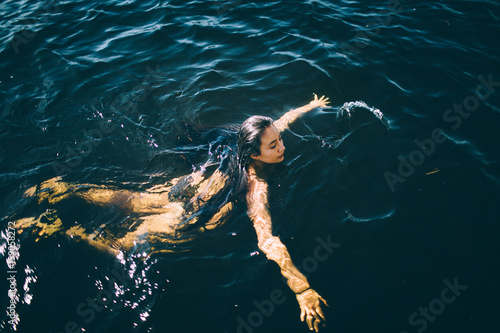 Naked girls and boys swim together Young Girl Swimming Naked Stock Photo Adobe Stock