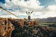 © Micky Wiswedel/Stocksy - Man balance walking on a highline or tight rope high over a mountain valley at sunset