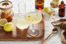 Honey, Lemon, Chamomile Cocktail With Chile Oil