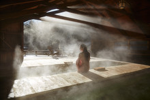 Woman Relaxing At Spa With Hot Springs
