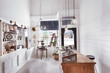 © Trinette Reed/Stocksy - Architecture image of interior of small artisan retail store