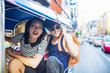 © Lumina/Stocksy - Couple Riding in a Tuk Tuk Taxi in Bangkok