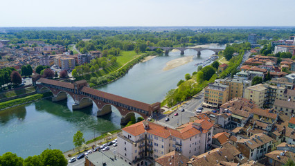 Wall Mural - Aerial video shooting with drone on Pavia, famous Lombardia city near the Ticino river in northern Italy