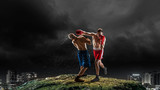 Fototapeta Sport - Box fighters trainning outdoor . Mixed media