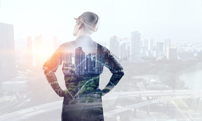 Engineer man viewing cityscape