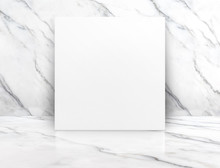 Blank White Poster Canvas In White Glossy Marble Floor Leaning At Wall,Mock Up Template For Display Or Montage Of Design Or Text,Business Presentation