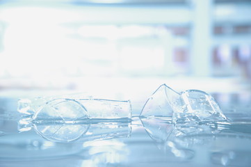 Wall Mural - broken beaker glass in science laboratory