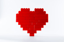 Red Heart Made From Lego Blocks On White Background