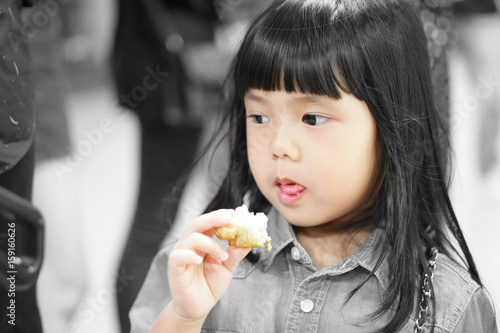 Asian Children Cute Or Kid Girl And Long Black Hair Eating Bread