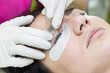 © lester120 - Woman on the procedure for eyelash extensions, eyelashes lamination