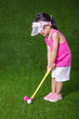 Leinwandbild Motiv Asian Chinese little girl playing golf