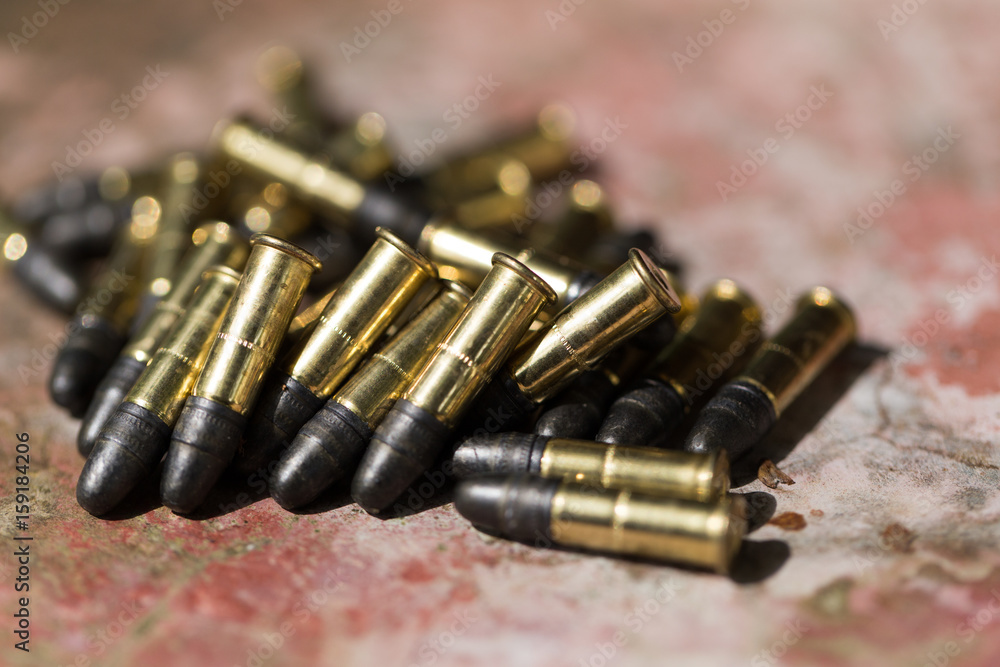 Many ammunition bullets. 22 LR for long rifle Stock Photo | Adobe Stock