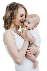 young beautiful mother with baby laughing isolated on white background