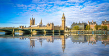 Big Ben And Westminster Parliament With Blurry Refletion In London, United Kingdom At Sunny Day.