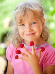 Poster - Little girl with raspberry