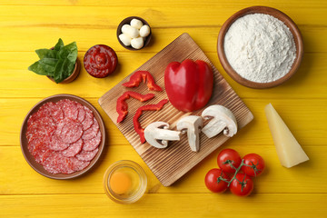 Poster - Ingredients for pizza on wooden  background