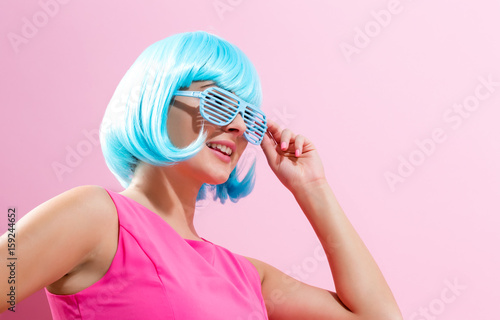 Portrait of a woman in a bright blue wig