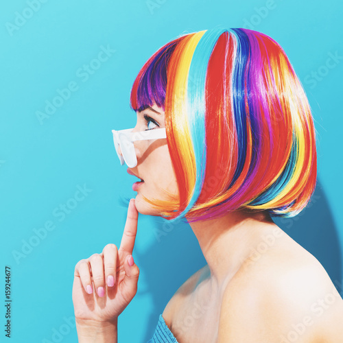 Beautiful woman in a colorful wig