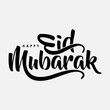 isolated calligraphy of happy eid mubarak with black color