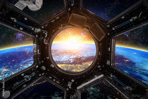 Fotografía Earth and Spacecraft. Elements of this image furnished by NASA.