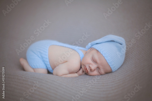 Studio Shoot Of Cute 10 Days Old Newborn Baby Sleeping On His Stomach On A Soft Blanket In A Blue Hat And Funny Panties Stock Photo Adobe Stock