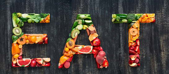 Wall Mural - Raw fruits and veg forming food related words