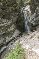 Waterfall at the end of the Voje valley in the Mostnica Gorge not far from lake Bohinj in Slovenia