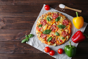 Sticker - Composition of tasty pizza, vegetables and spoon on wooden background