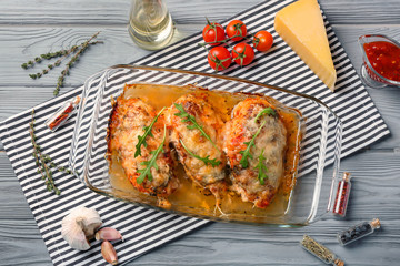 Delicious chicken parmesan meal with cheese and sauce in baking dish