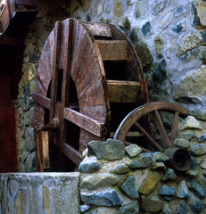 An authentic wooden wheel of an old water mill