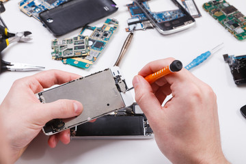 Aufkleber - Repairman disassembling phone with screwdriver