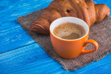 Sticker - coffee cup with tasty croissant