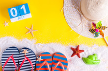 July 1st. Image Of July 1 Calendar With Summer Beach Accessories And Traveler Outfit On Background. Summer Vacation Concept