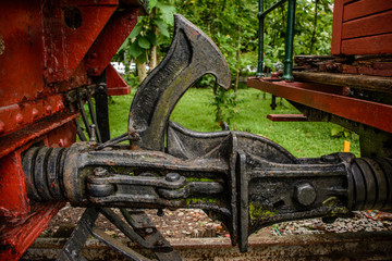 closeup photo of joint of carriages, ancient train