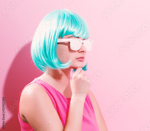 Portrait of a woman in a bright blue wig