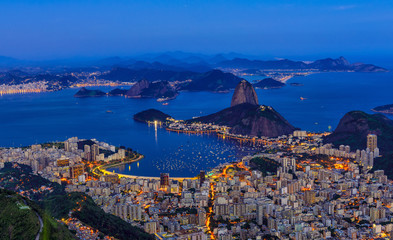 Fototapete - Night view of mountain Sugar Loaf and Botafogo in Rio de Janeiro. Brazil