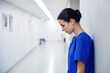 © Syda Productions - sad female nurse at hospital corridor