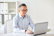 © Syda Productions - businessman in eyeglasses with laptop office