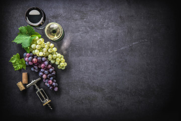 Wineglasses with grapes and corks