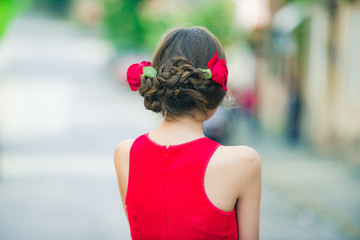 Sticker - woman back view with red roses in stylish hair