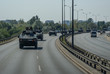 Polish military vehicles moving in a column by road. Poland