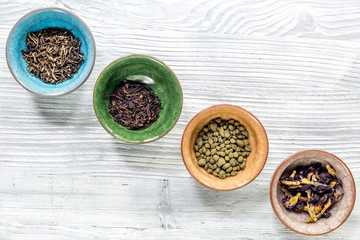 Wall Mural - Drink herbal tea with brew gray wooden table background top view