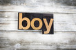© enterlinedesign - Boy Letterpress Word on Wooden Background