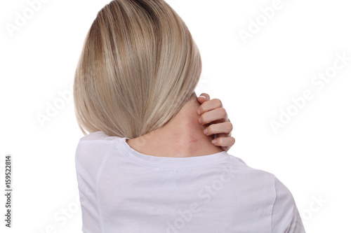фотографія Woman Scratching an itch on white background