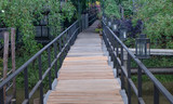 Fototapeta Pomosty - The wooden bridge in the park