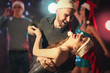 © Africa Studio - Friends at Christmas party in night club