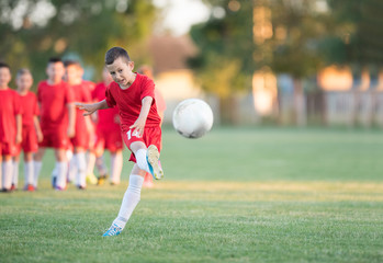 Poster - Kids soccer football - children players exercising before match on soccer field