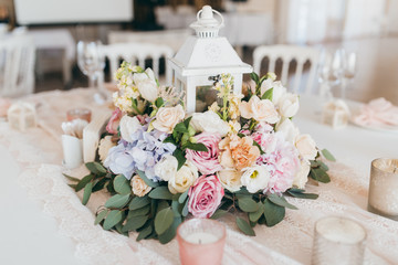 Pink wedding decoration with white and green flowers